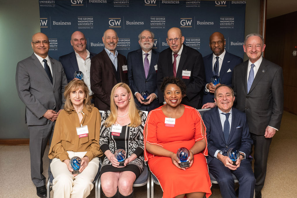 GWSB Entrepreneurial Hall of Fame inductees pose for a photo with GW President Mark S. Wrighton and GW School of Business Dean Anuj Mehrotra