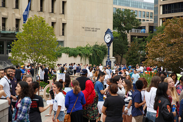 GW University students gather for an event in Kogan Plaza on the GW campus