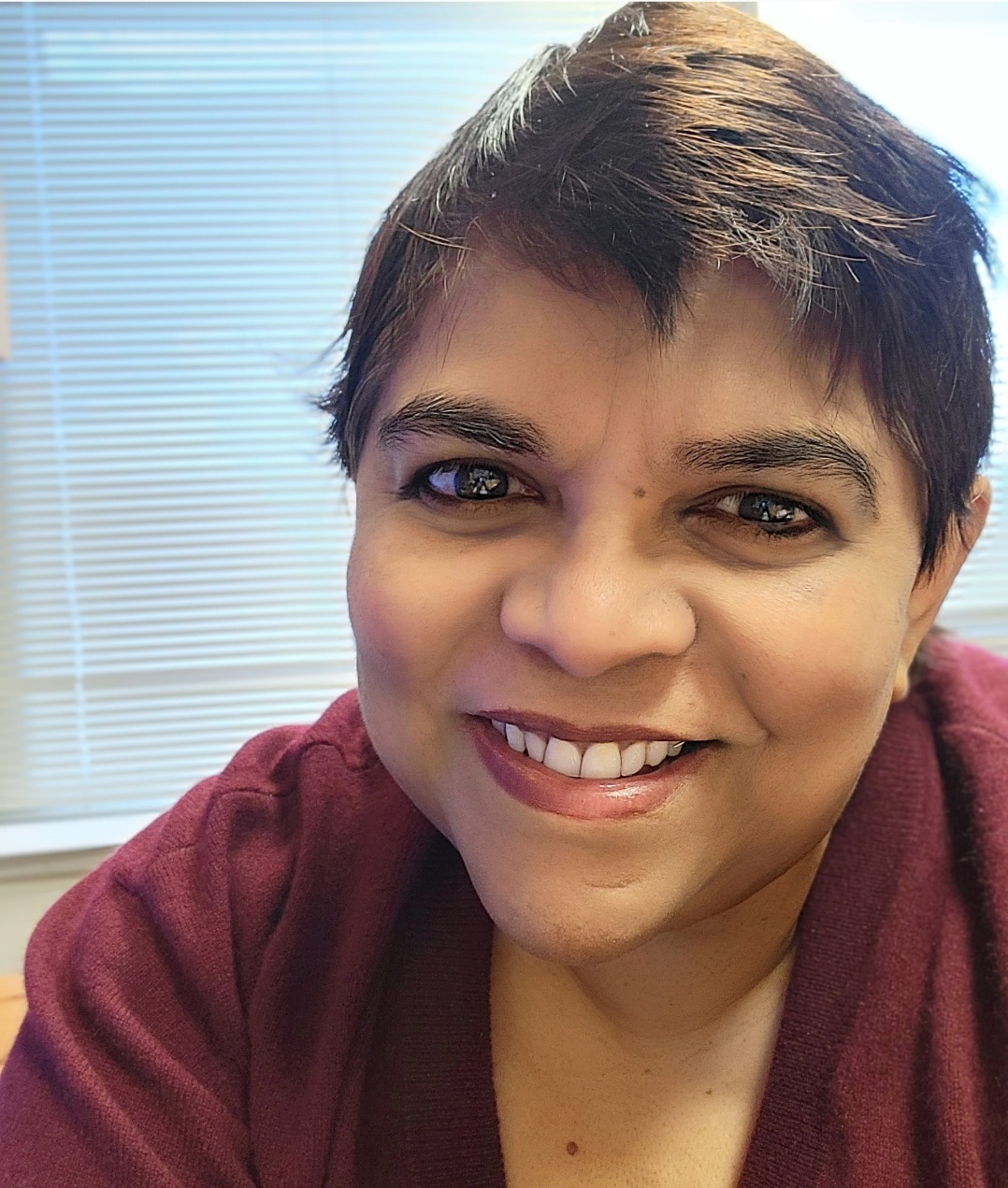 A photo of Anoma Kulathunga, visiting assistant professor of international business at the GW School of Business.