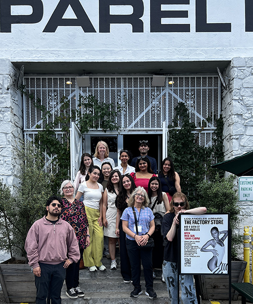 GW students in the International Business Ethics and Sustainability Case Competition pose for a photo at the LA offices of fashion brand LA Apparel.