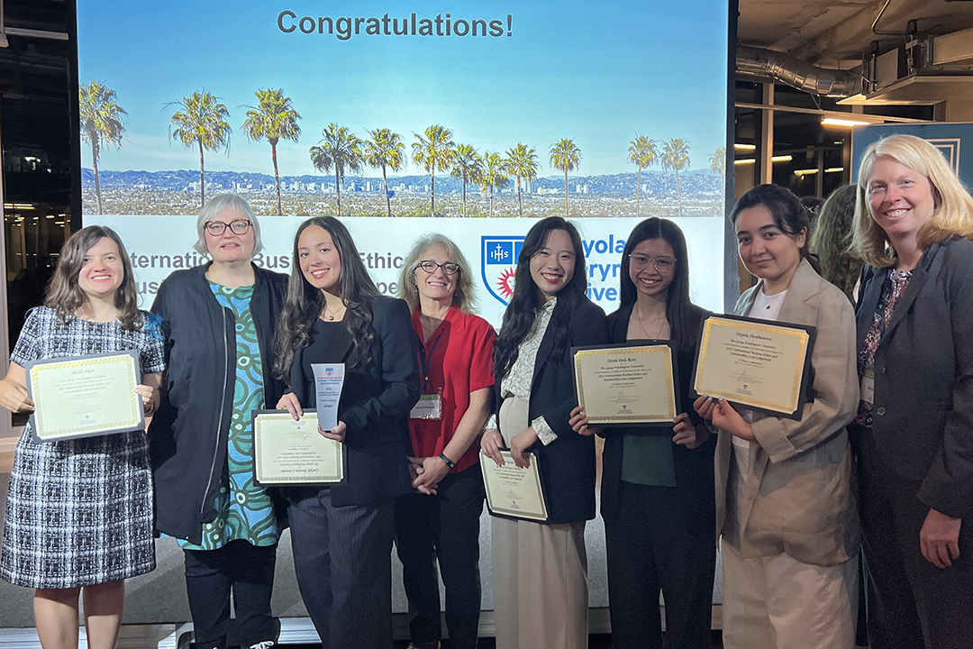 GW graduate students in the International Business Ethics and Sustainability Case Competition pose for a photo.