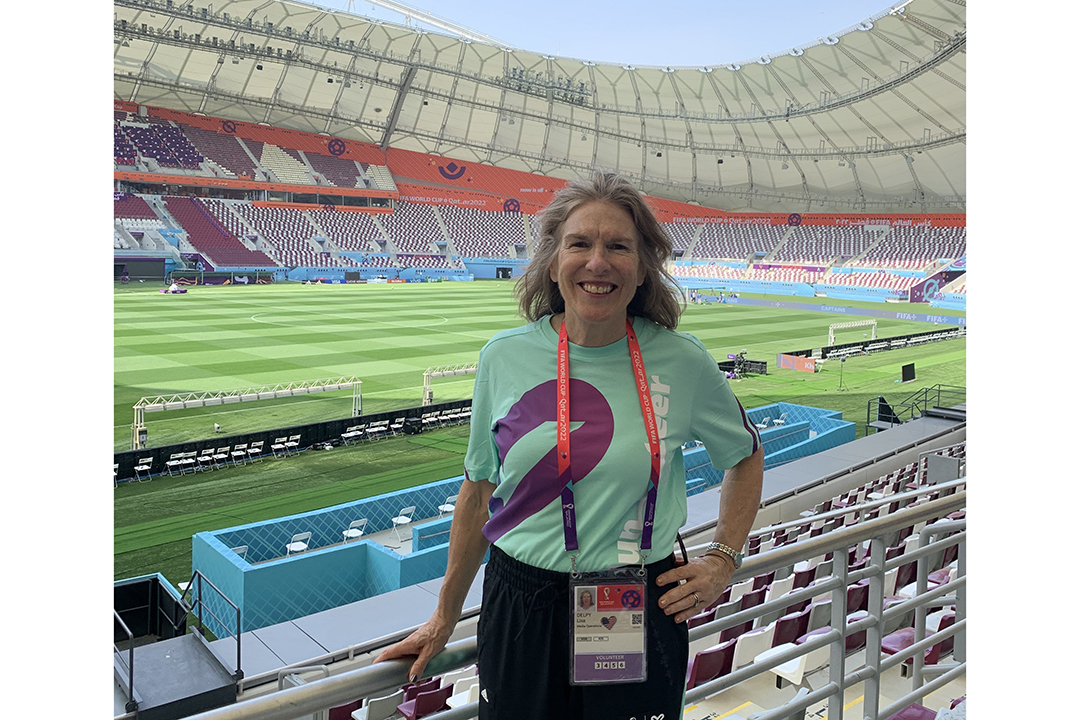 Lisa Delpy Neirotti at a sports arena