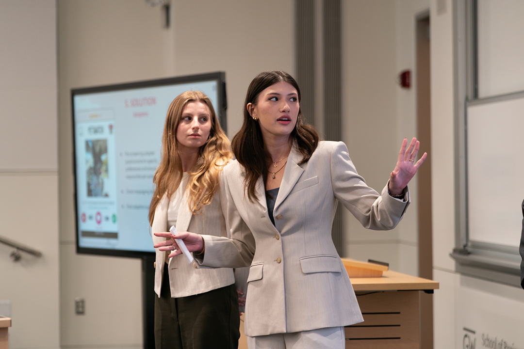 Two women pitching and speaking
