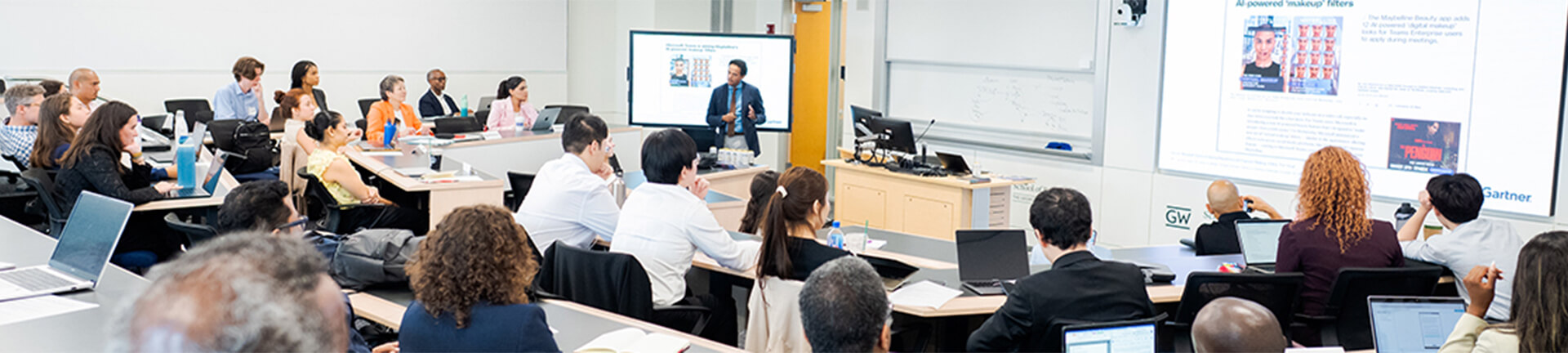 GWSB students in a classroom listening to a lecture
