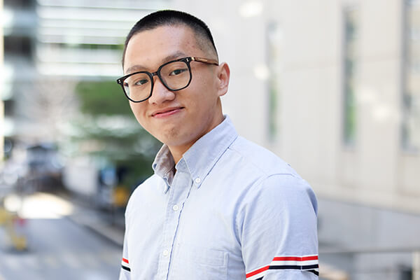 student smiles at camera