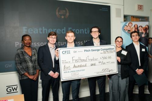 members of the student entrepreneur team Feathered Frontier pose for a photo after winning a category in the 2024 Pitch George competition