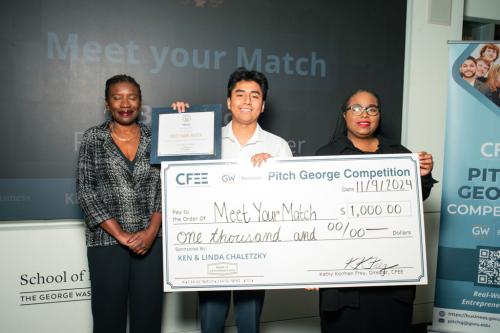 members of the student entrepreneur team Meet Your Match pose for a photo after winning a category in the 2024 Pitch George competition 
