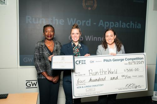 members of the student entrepreneur team Run the World pose for a photo after winning a category in the 2024 Pitch George competition