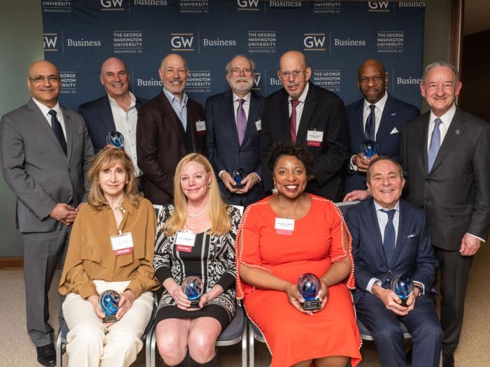 GWSB Entrepreneurial Hall of Fame inductees pose for a photo with GW President Mark S. Wrighton and GW School of Business Dean Anuj Mehrotra
