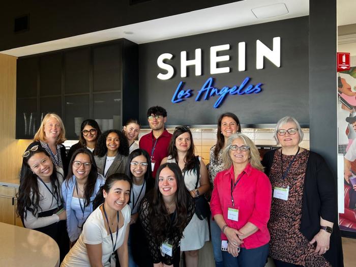 GW students in the International Business Ethics and Sustainability Case Competition pose for a photo at the LA offices of fashion brand Shein.
