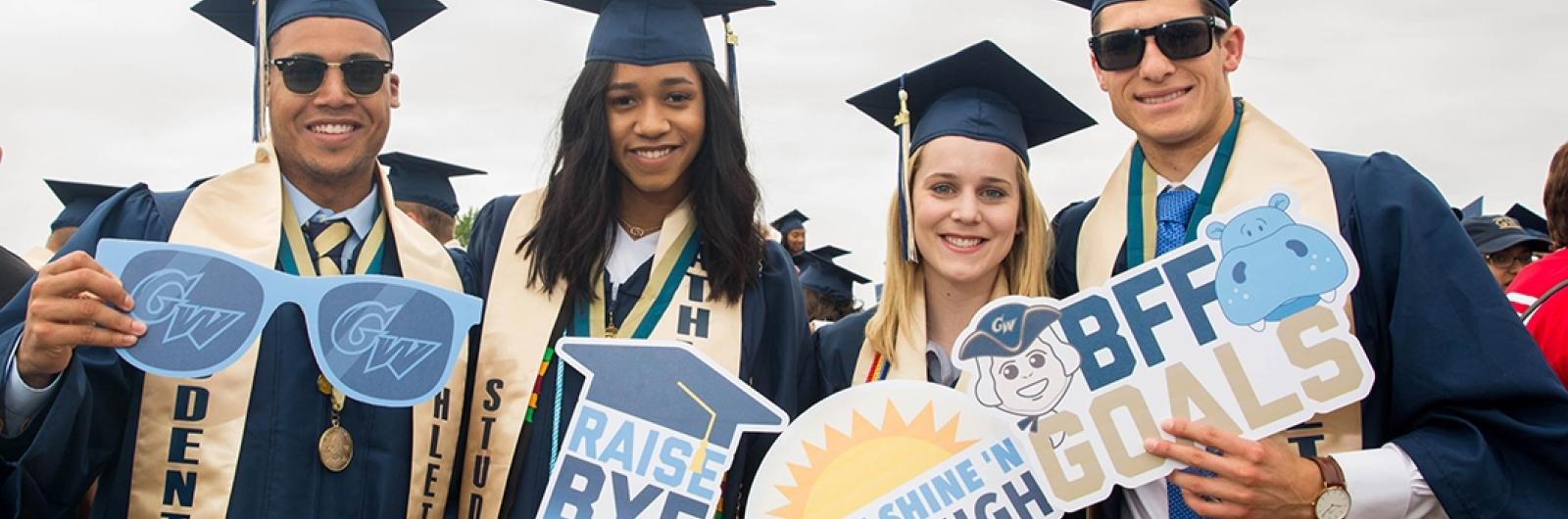 four GW graduates celebrate commencement on the National Mall