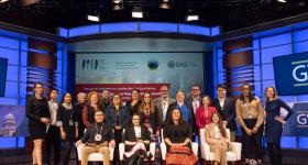 A large group of people, participants and others associated with the Distinguished Indigenous Leaders Lecture Series, pose for a photo.