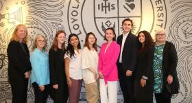 Director of GW-CIBER Anna Helm (right) with GW students