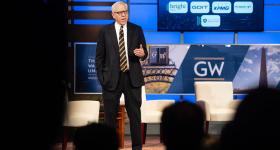 David Rubenstein talks to a George Washington University audience about artificial intelligence at a GW Business policy forum.