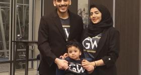 Mohamad Alahdal, Rahaf Alamoudi and their daughter Ayla sporting GW gear.