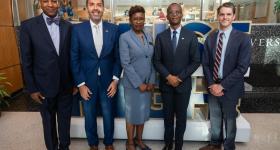 Attendees, from left to right: Winslow Sargeant (Genaesis); GW School of Business Professors Ayman EL Tarabishy and Interim Dean Vanessa Perry; Ndaba Nkosinathi Gaolathe (Vice President and Minister of Finance, Botswana); Vice Provost Mike Glatzer, Ambassador Mpho Churchchill O. Mophuting (Botswana); Kafuti Talahumbu (GW). (Photo by Linnea Farnsworth)